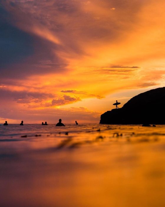 Surfing At Sunset
